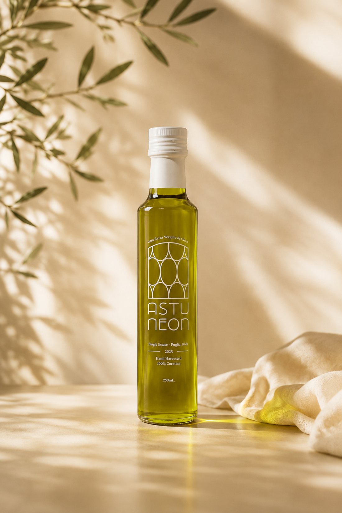 The Discovery bottle in soft morning light beside linen